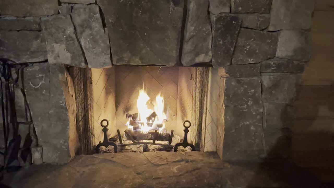 The wood-burning fireplace